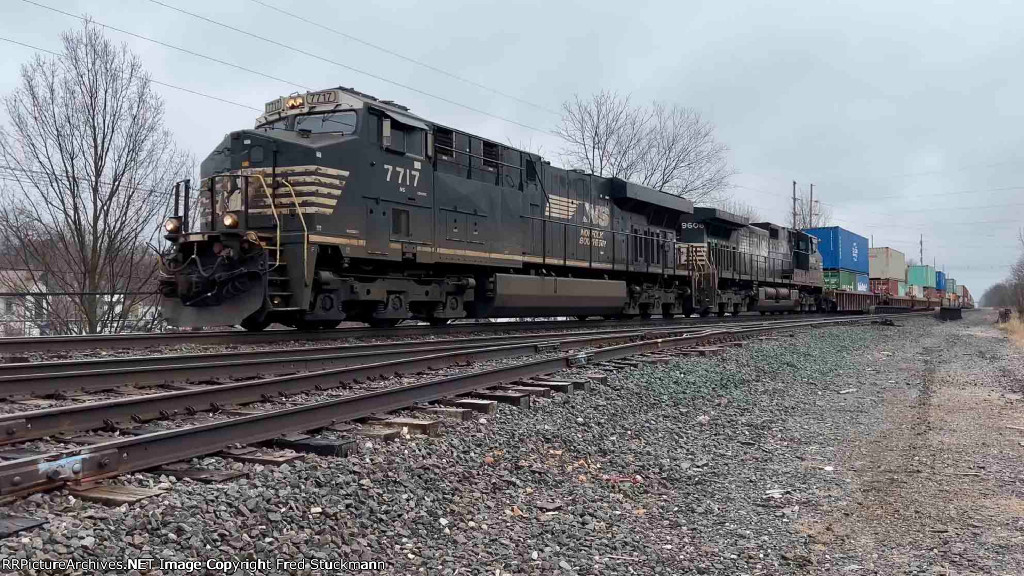 NS 7717 west with stacks.